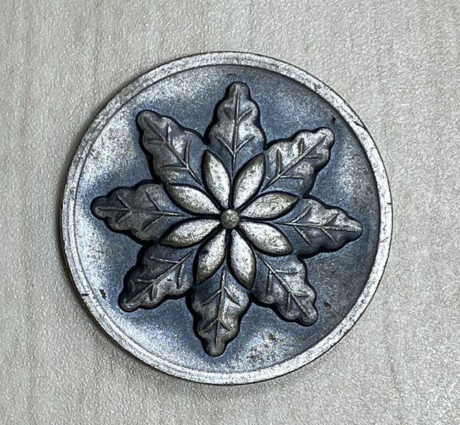 ファイル:1973 創立50周年記念メダル 表.jpg